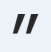 A bold, black double quotation mark symbol on a light gray background.